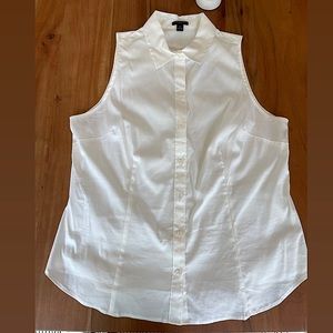 Sleeveless white collared shirt